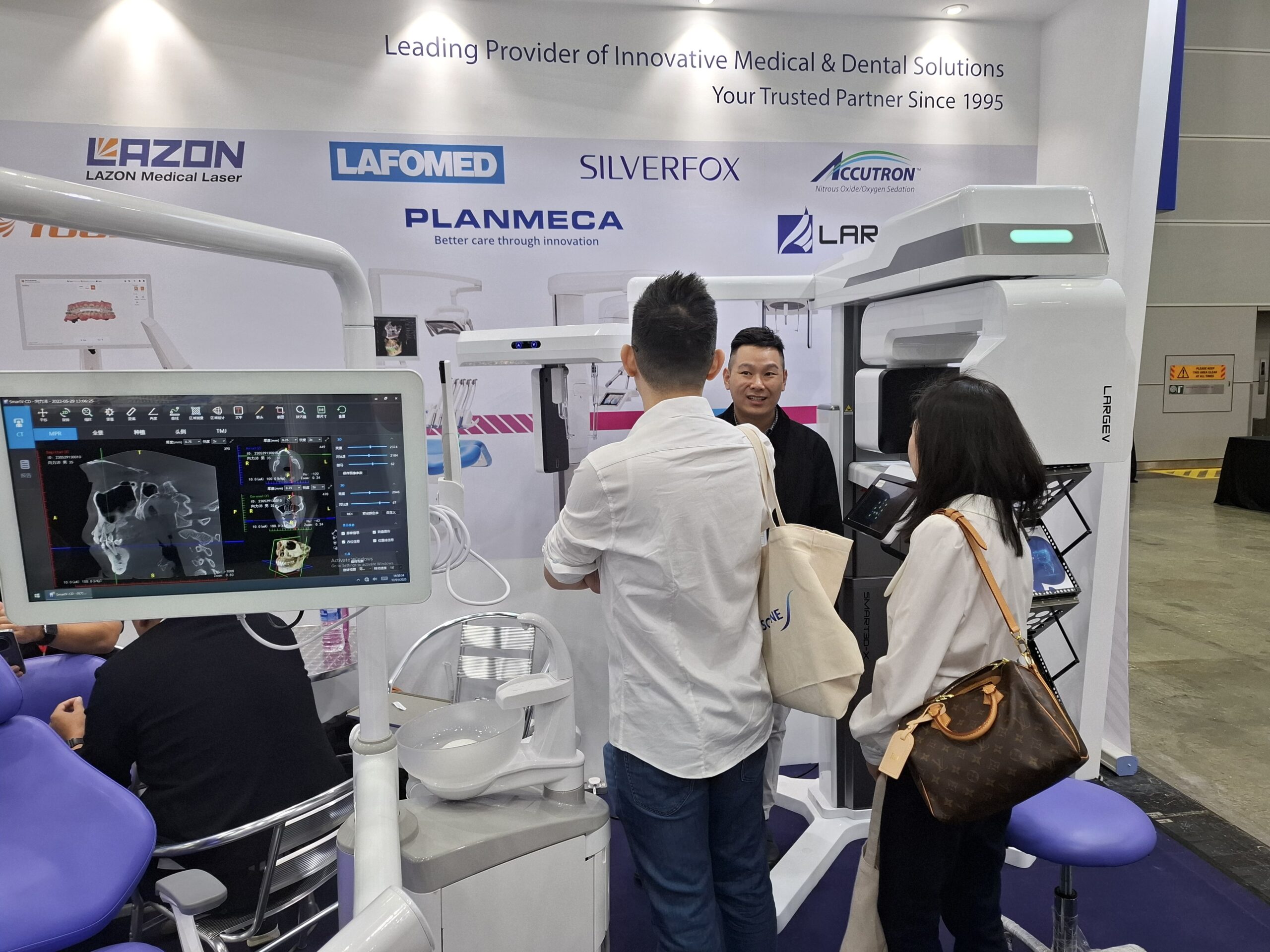 Medik-Link team engaging visitors with digital dentistry innovations, including LargeV Smart3D CBCT at SCATE 2025