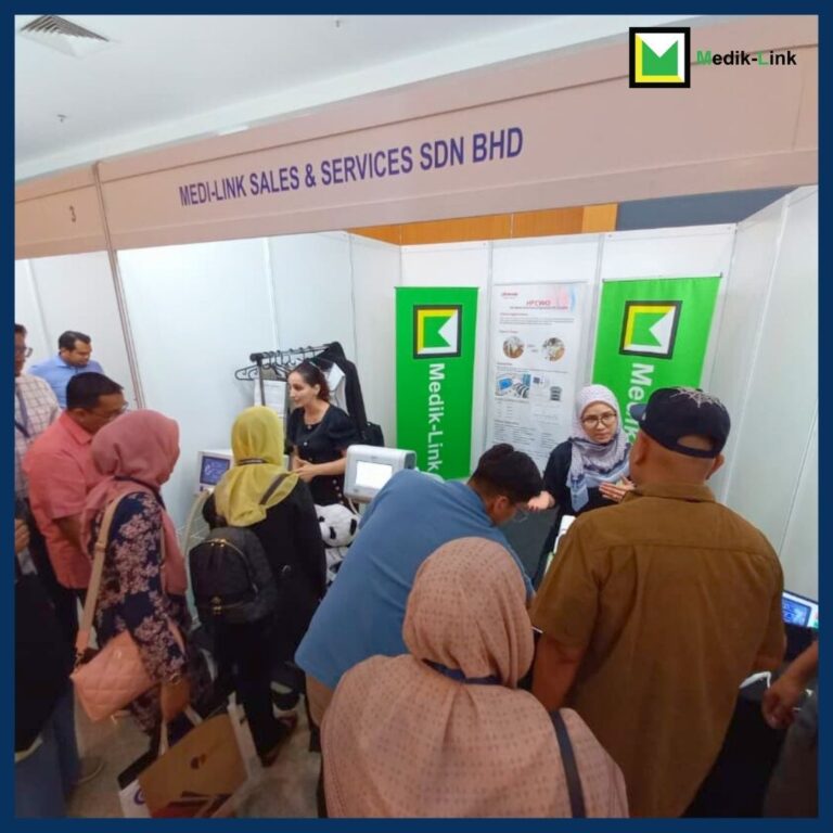 Visitors engaging with product demonstrations at Medik-Link’s medical equipment booth